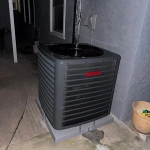 Residential condenser unit installed in a side yard
